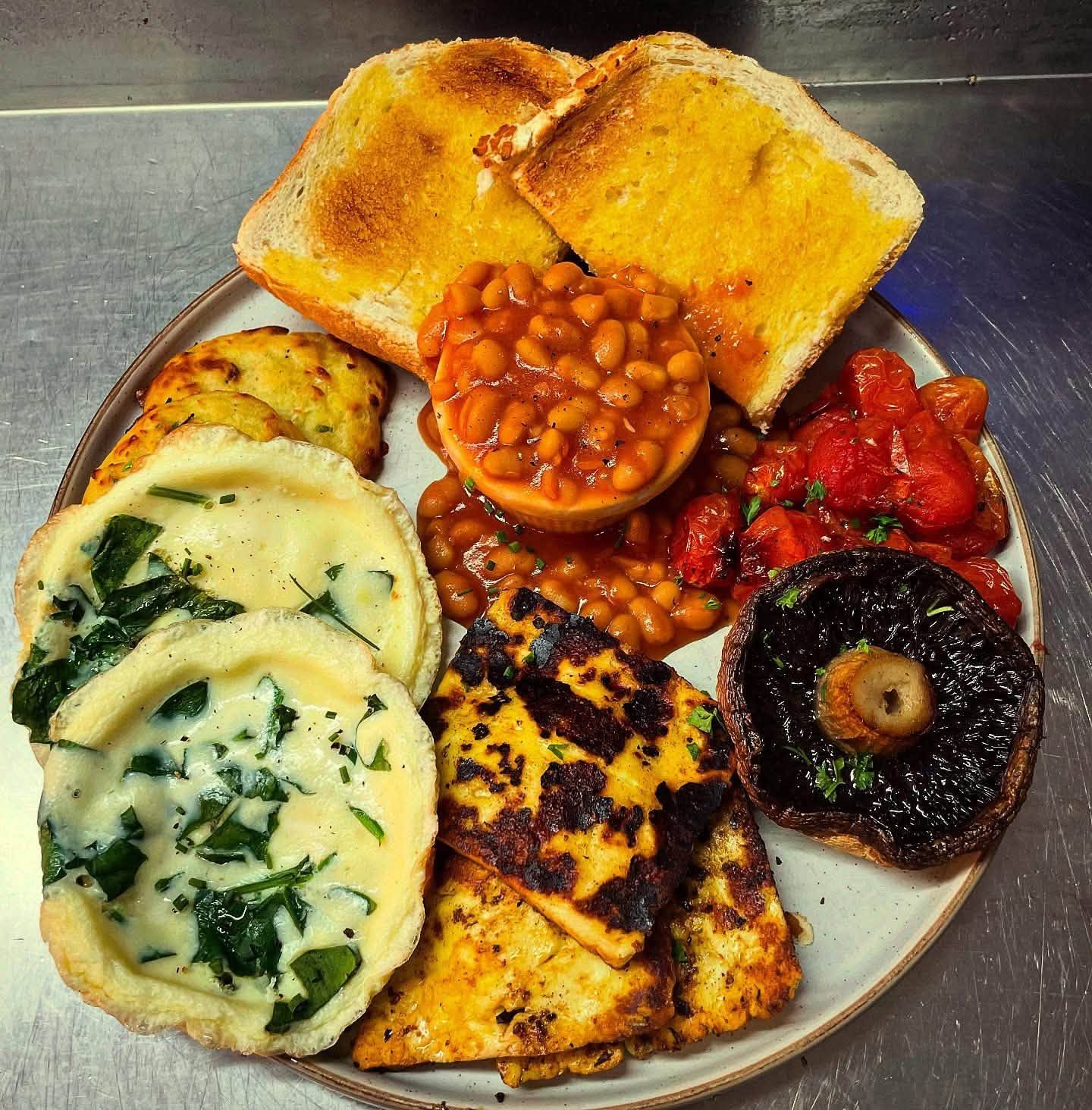 Vegetarian Breakfast Bodmin with eggs halloumi beans tomatoes mushrooms and toast